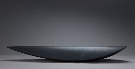 Armen Agop — black granite sculpture, hull-like profile, low stance